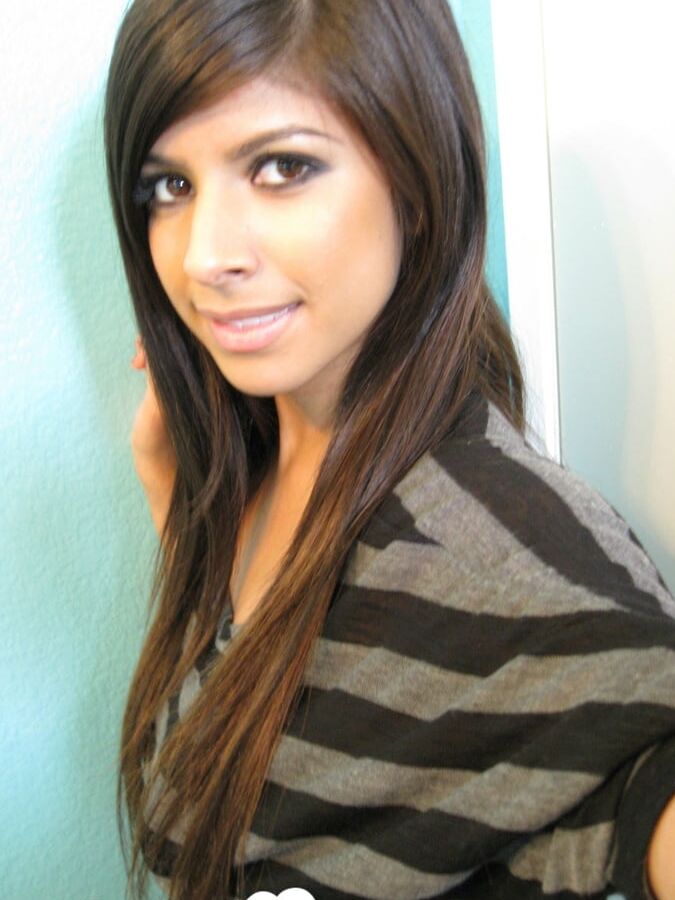 Brunette teases a bit in the bathroom