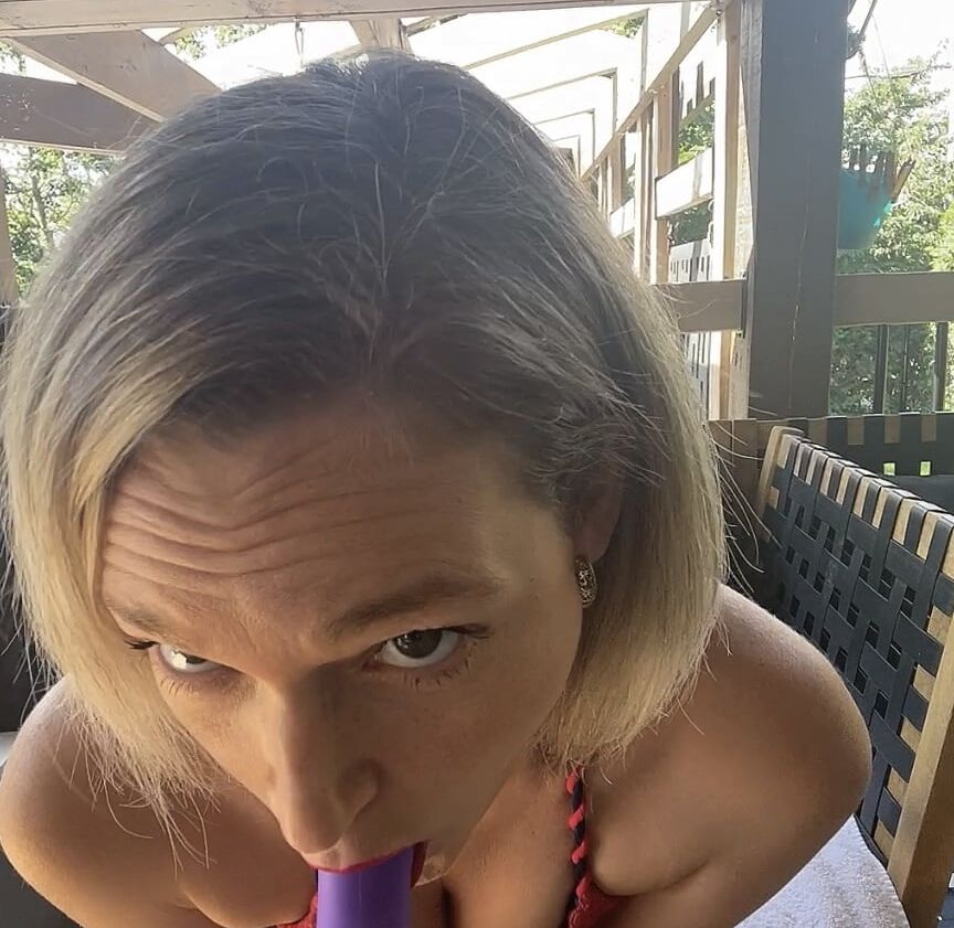 Bikini sucking pretty purple dildo