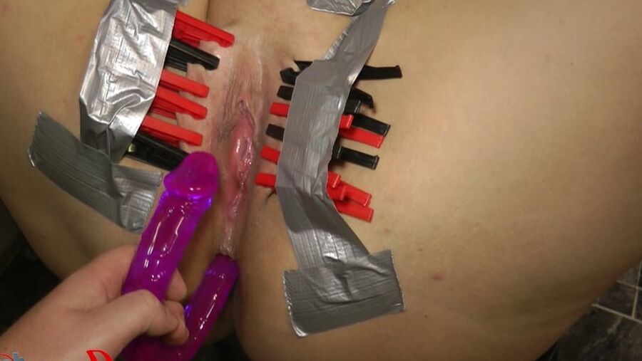 Clamped pussy fucked