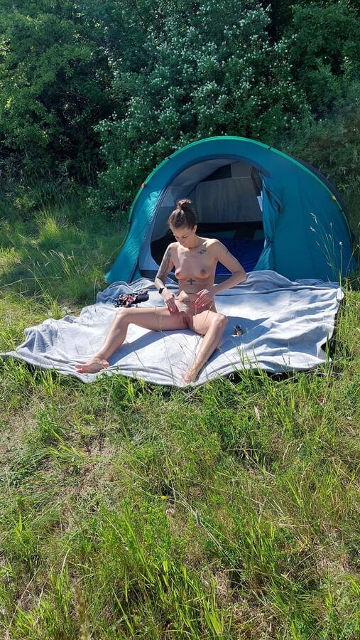 Nudist MILF sunbathing and masturbating