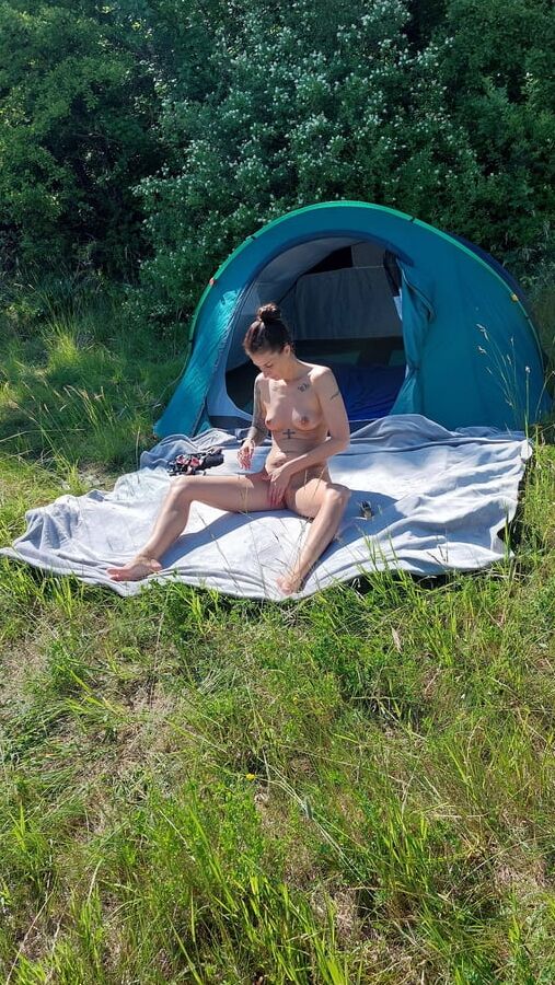 Nudist MILF sunbathing and masturbating