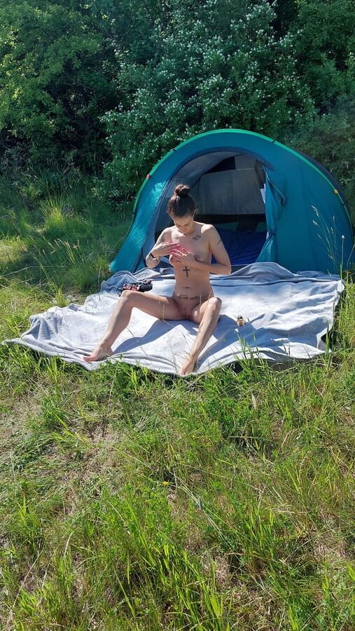 Nudist MILF sunbathing and masturbating