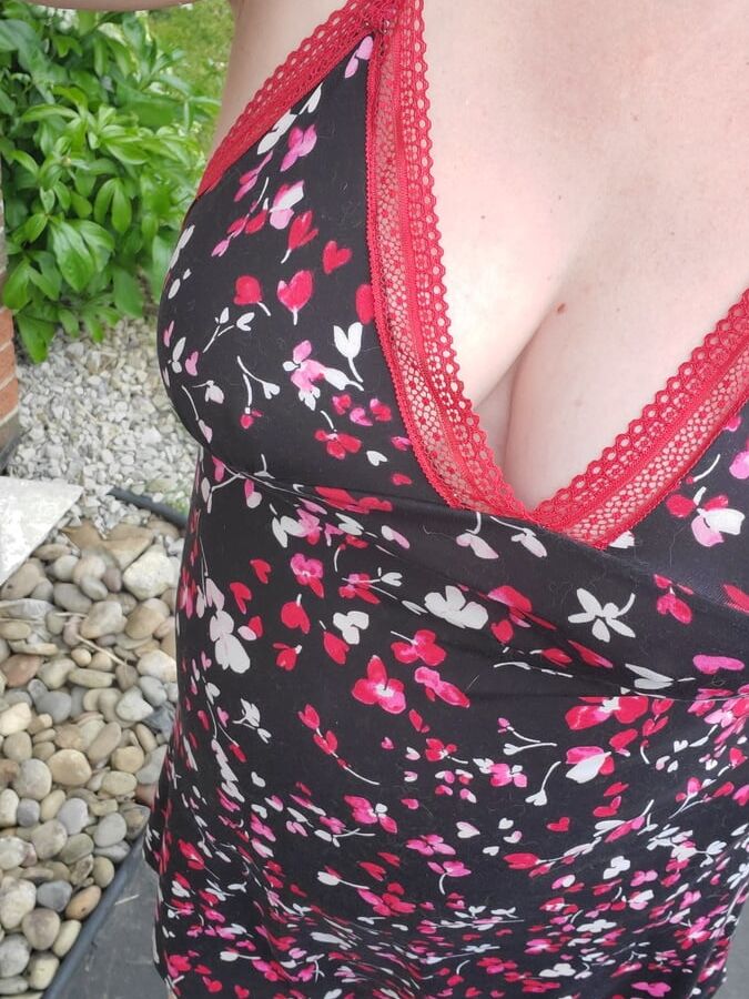 Daddy's babygirl showing off huge tits outside in the garden