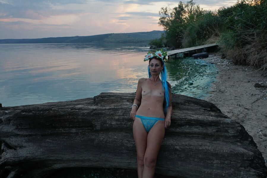 By the river