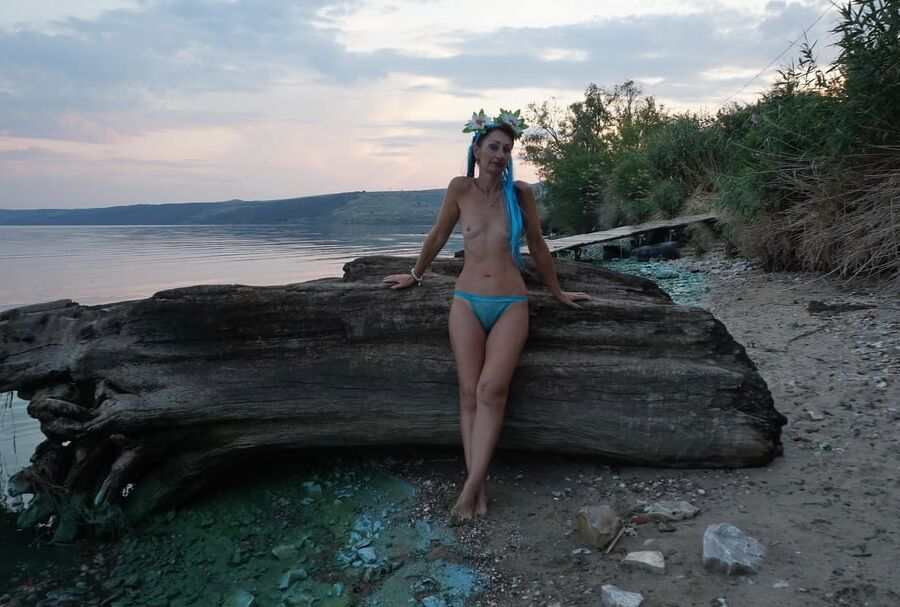 By the river