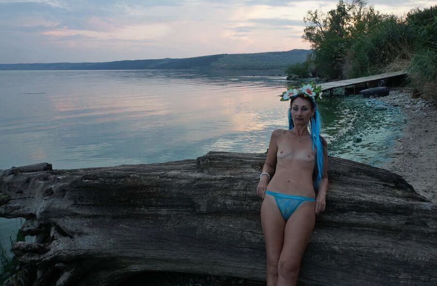 By the river