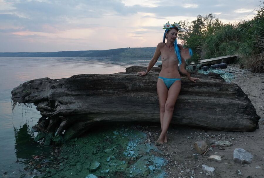 By the river