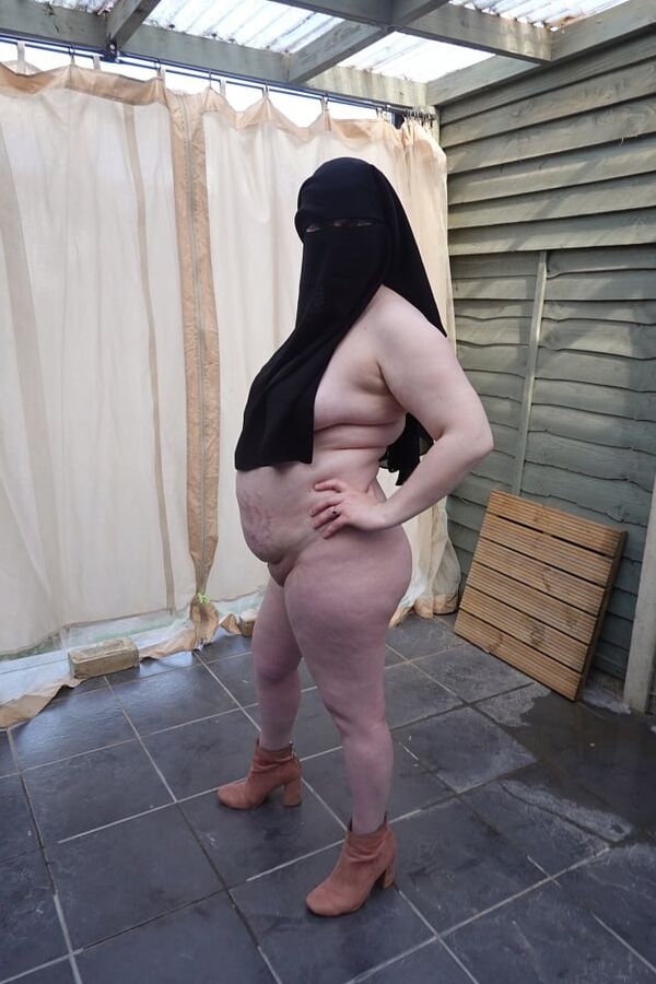 Nude in Niqab in ankle boots
