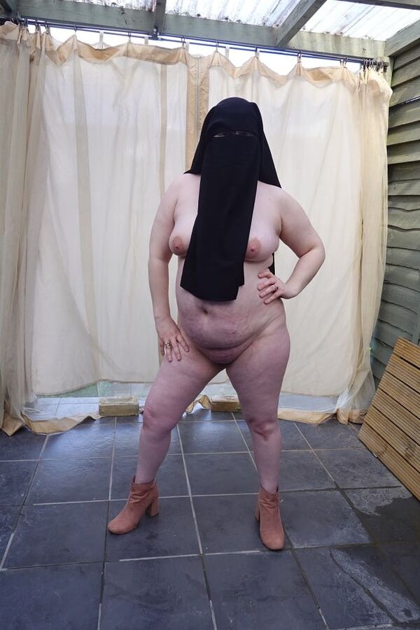 Nude in Niqab in ankle boots