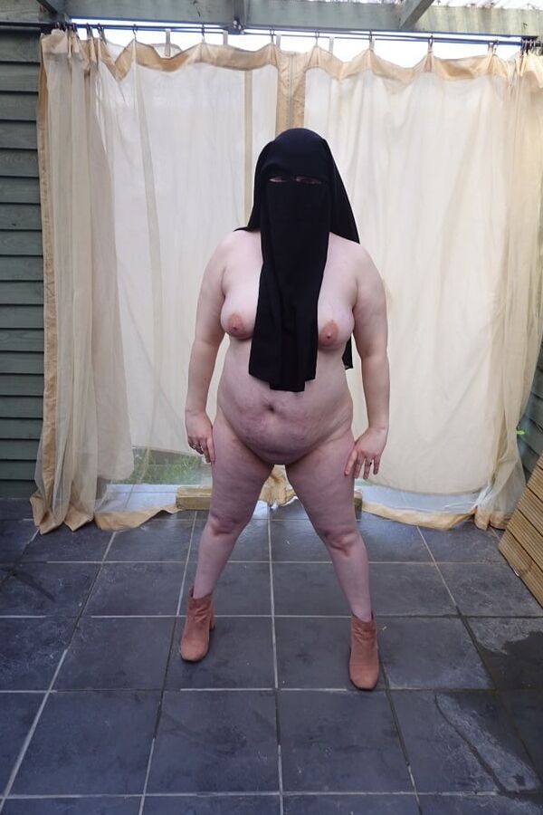 Nude in Niqab in ankle boots