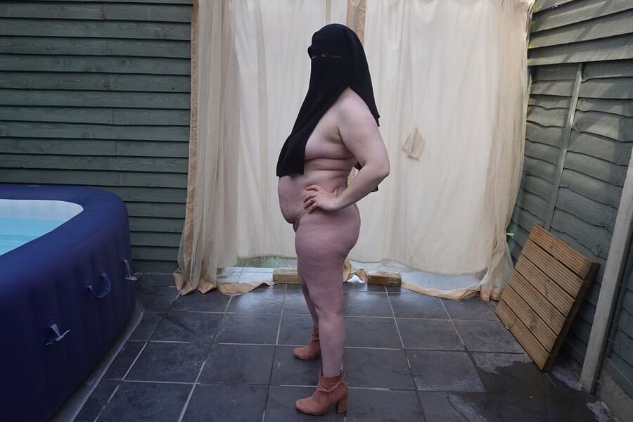 Nude in Niqab in ankle boots