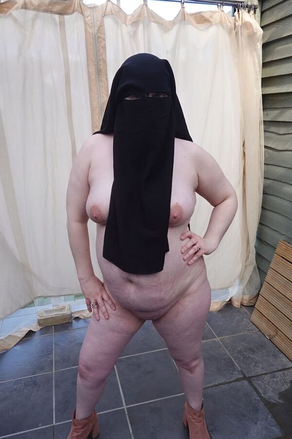 Nude in Niqab in ankle boots