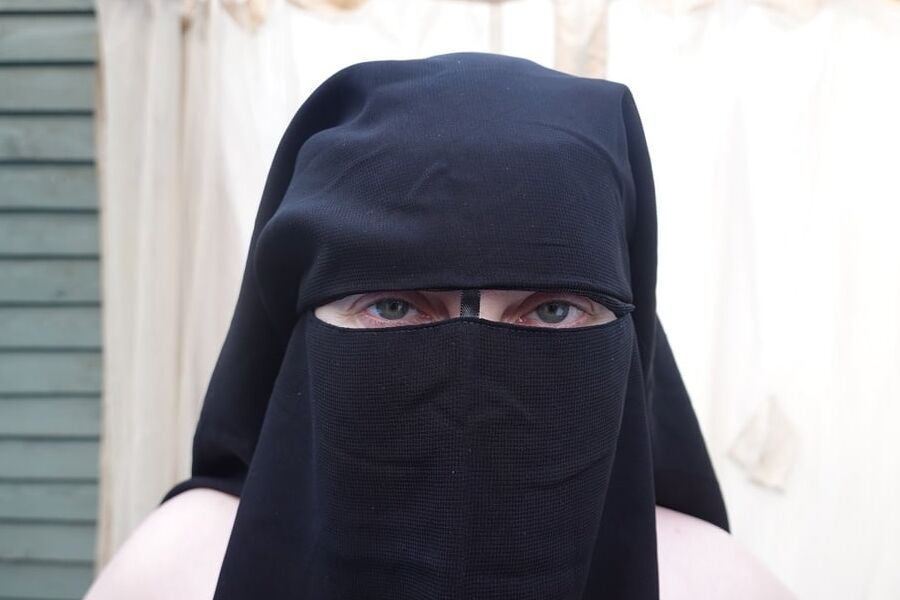 Nude in Niqab in ankle boots