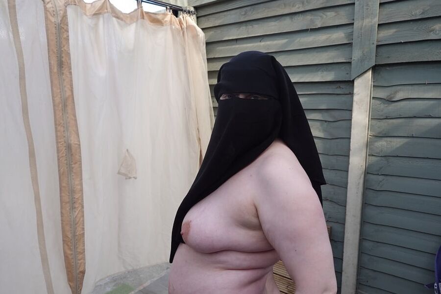 Nude in Niqab in ankle boots