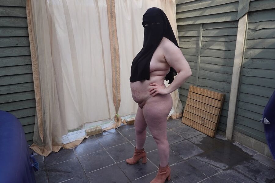 Nude in Niqab in ankle boots