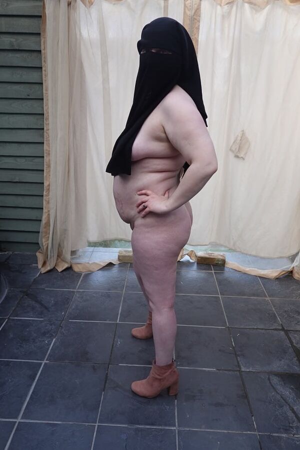 Nude in Niqab in ankle boots