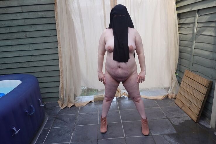 Nude in Niqab in ankle boots
