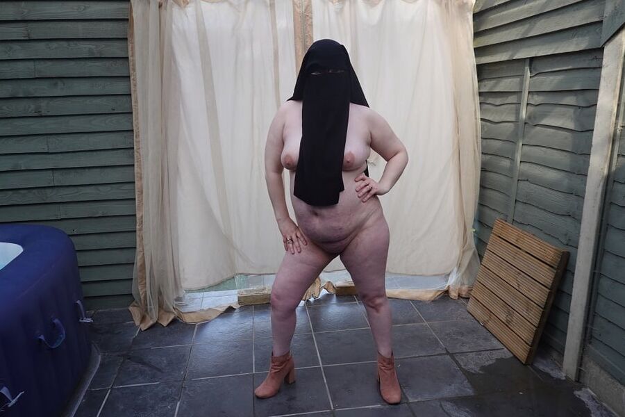Nude in Niqab in ankle boots