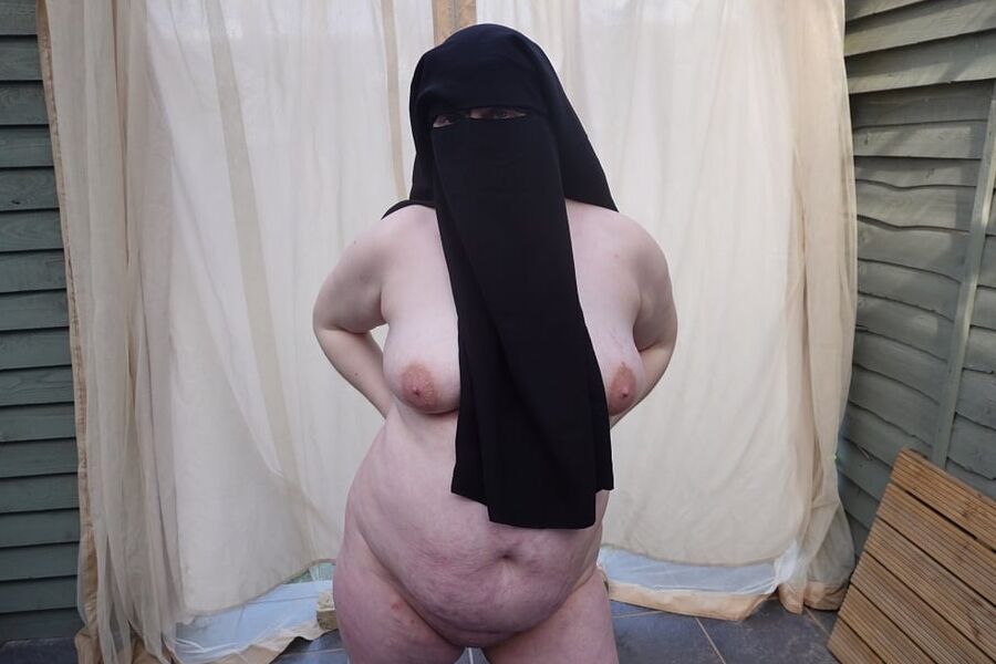 Nude in Niqab in ankle boots