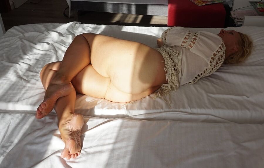 Selena's posing in a sunlight 22