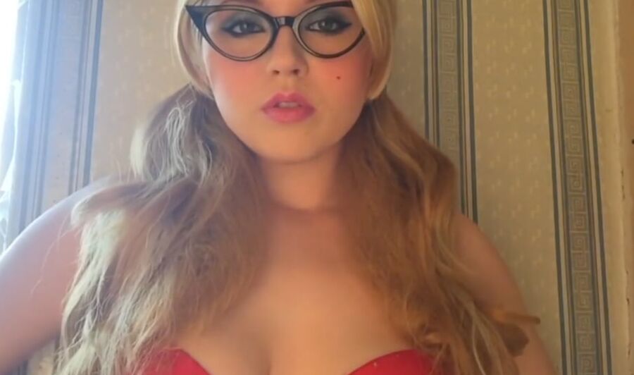 Perfect teen with pigtails