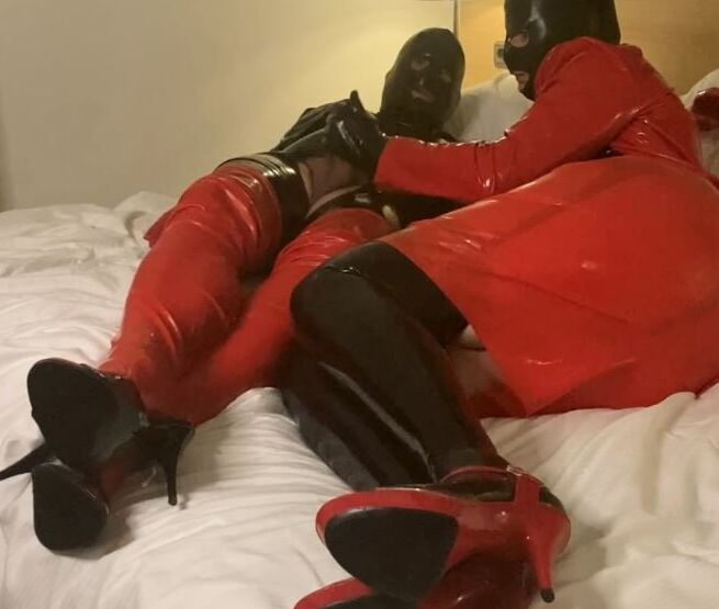 Black and Red Latex Fetish Couple