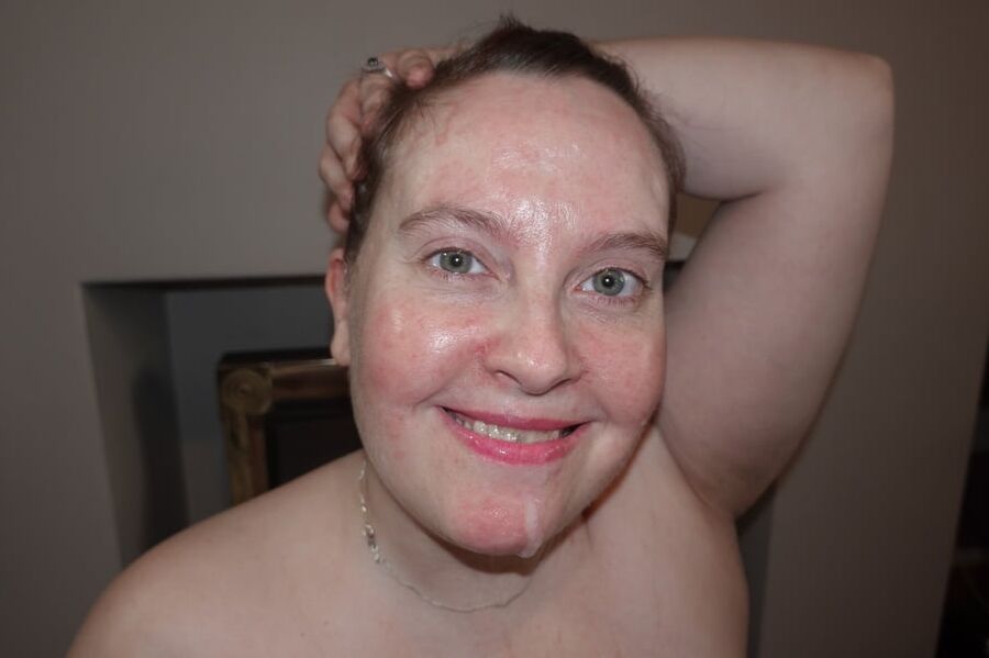 Proud Wife showing off cum on her chin