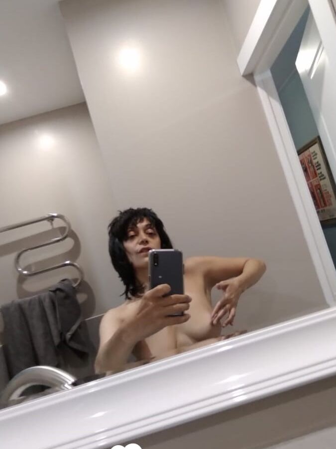 Short MILF with big tits loves to tease