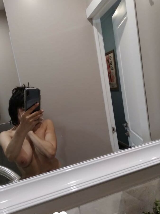 Short MILF with big tits loves to tease