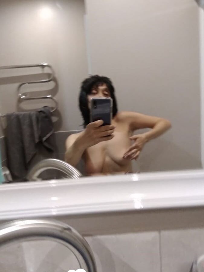 Short MILF with big tits loves to tease