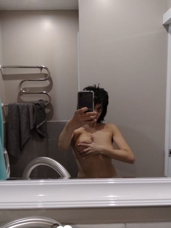 Short MILF with big tits loves to tease
