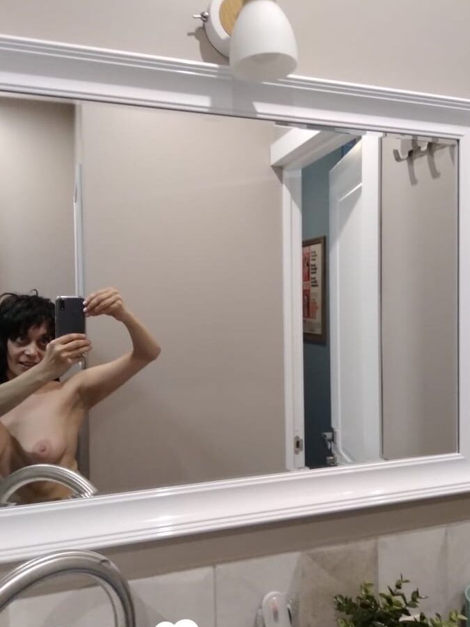 Short MILF with big tits loves to tease