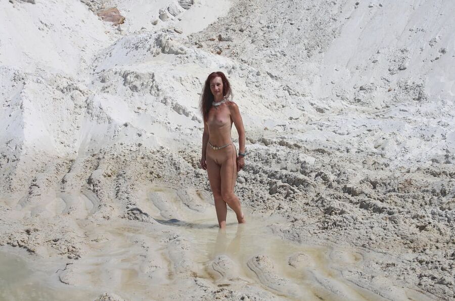 Bathing in white clay quarry