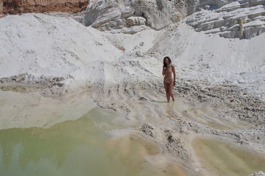 Bathing in white clay quarry