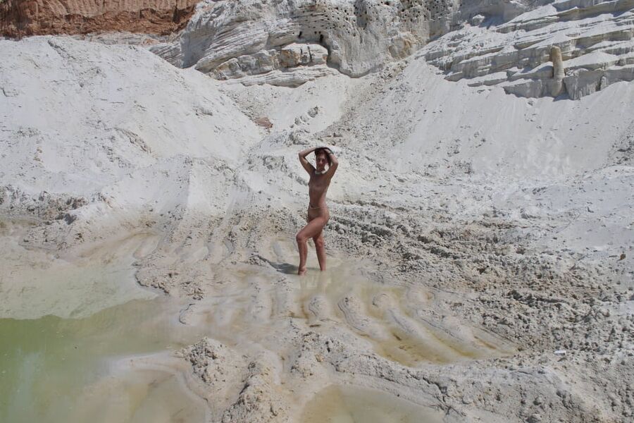 Bathing in white clay quarry