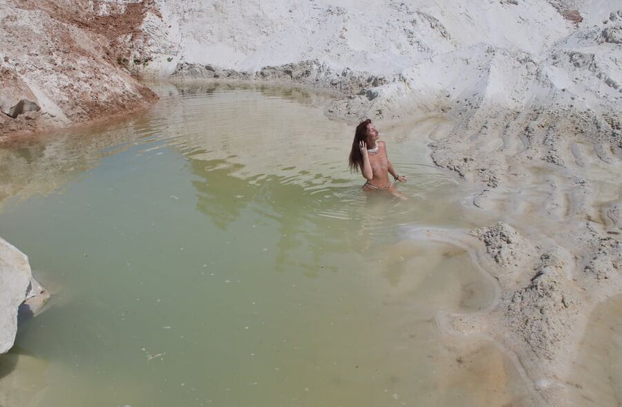 Bathing in white clay quarry