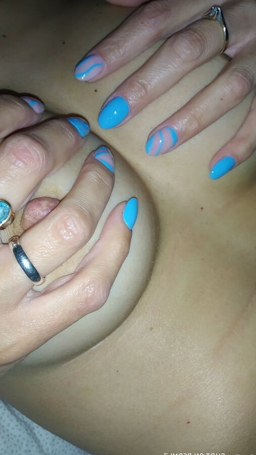 Wife shows new nails on dildo and tits