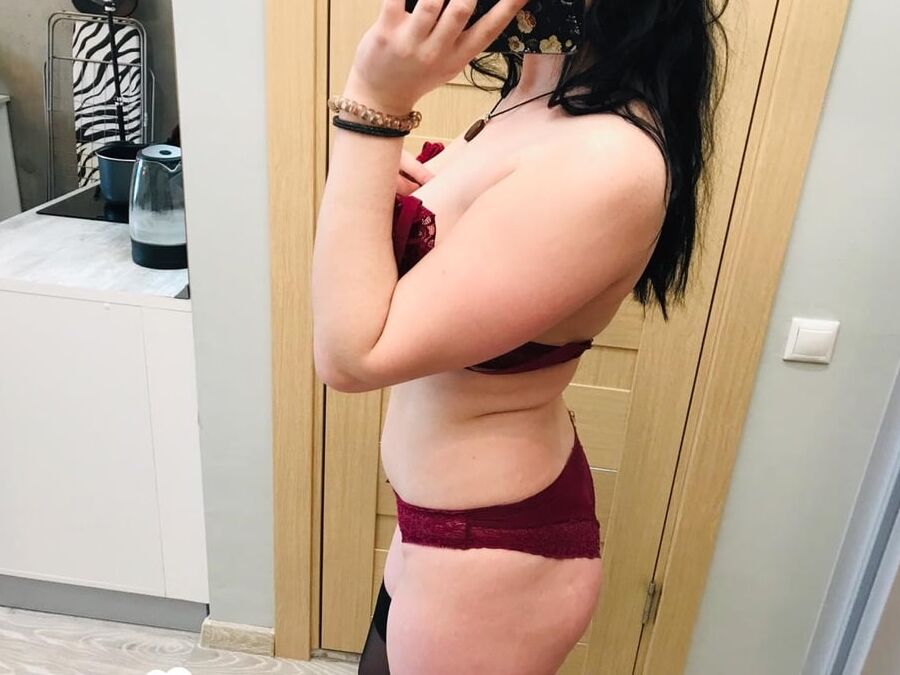 Thick beauty posing in some black stockings