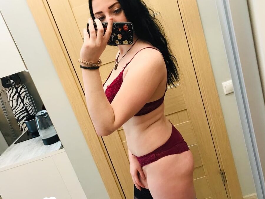 Thick beauty posing in some black stockings