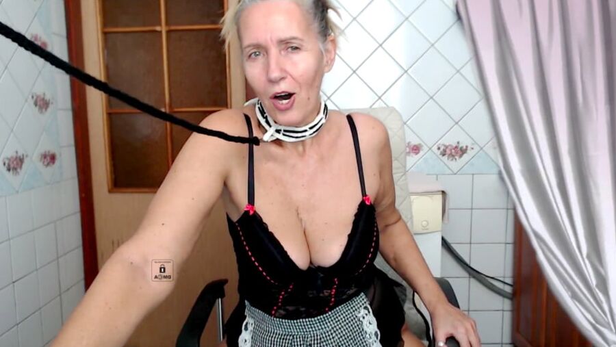 Sexy but naughty Lukerya with a cheerful smile and a collar