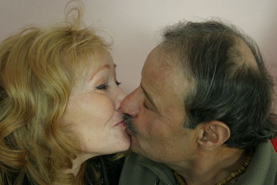 Two elderly gentlemen get a young girl to accompany them and