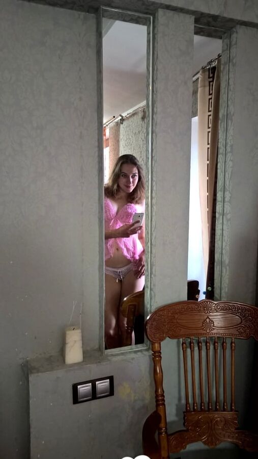 Nerdy cutie tries on some sexy clothes