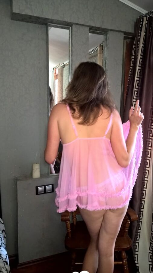 Nerdy cutie tries on some sexy clothes
