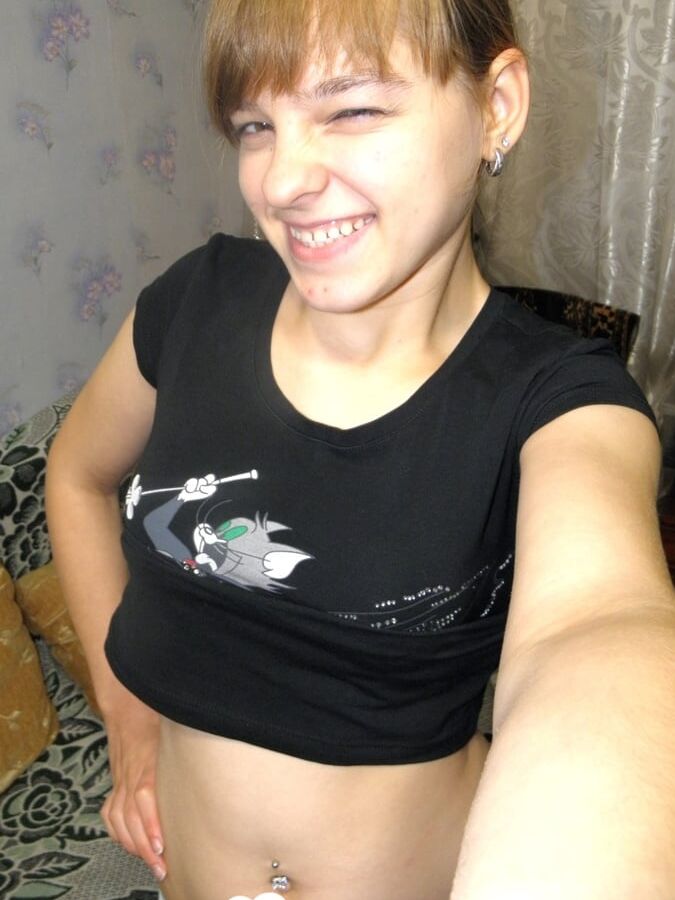 Hot teen taking some selfies at home