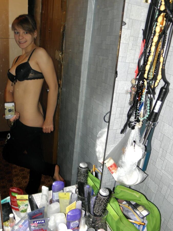 Hot teen taking some selfies at home