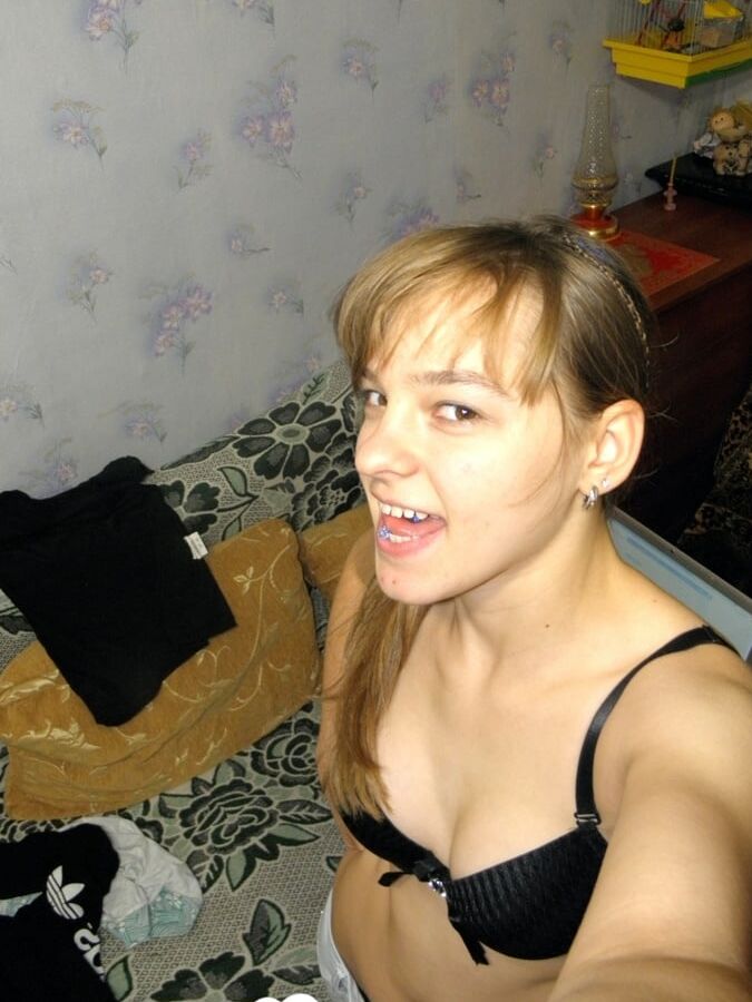Hot teen taking some selfies at home