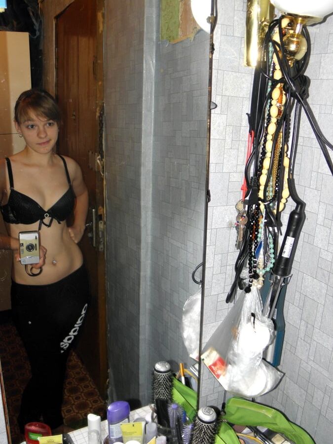 Hot teen taking some selfies at home