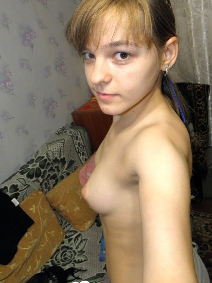 Hot teen taking some selfies at home