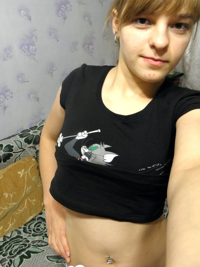 Hot teen taking some selfies at home
