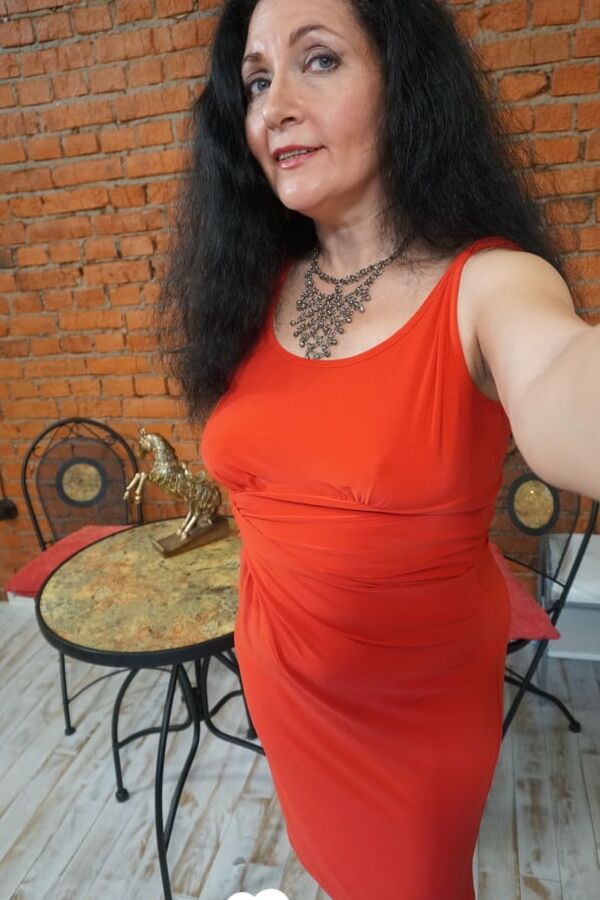 MILF with glasses teasing in various outfits